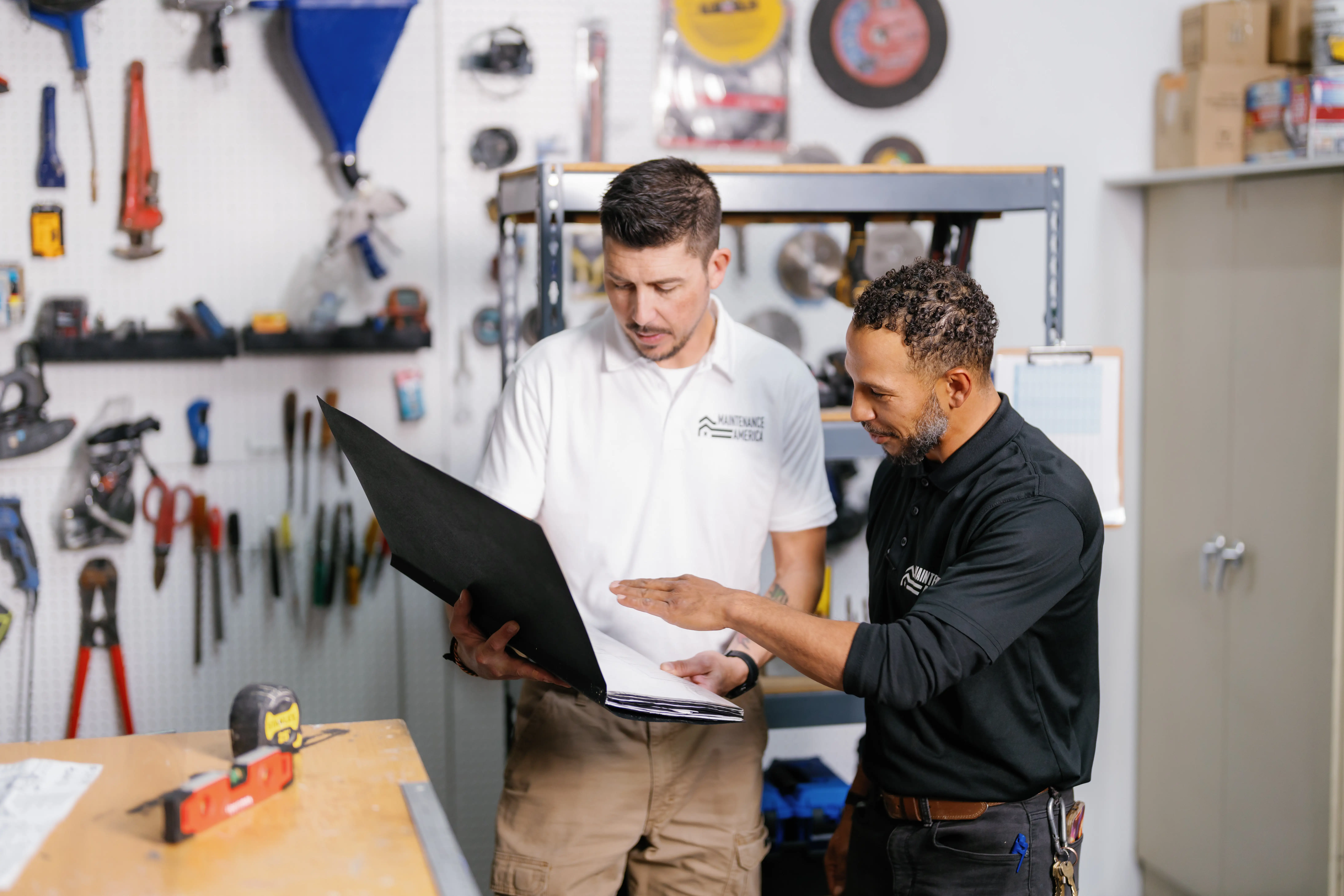 Tony Cuomo and a Maintenance America technician reviewing a job plan